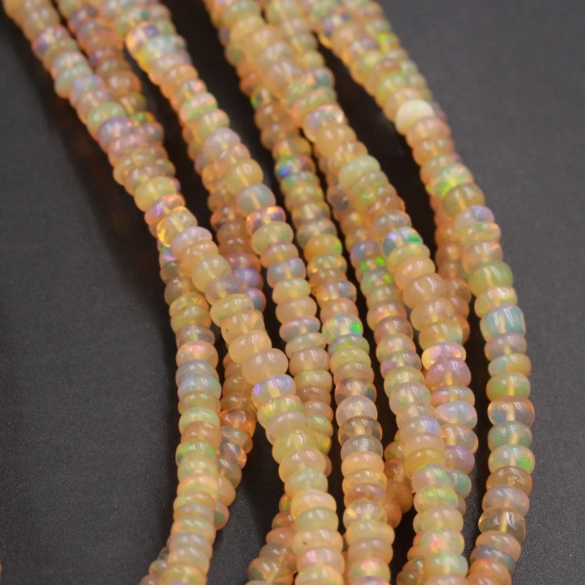 16 Inches Ethiopian Opal Beads Rondelle Graduating 3mm 4mm AAA Super Flashy Fiery Rainbow Yellow Opal Smooth Rondelle Beads 16" Strand A6