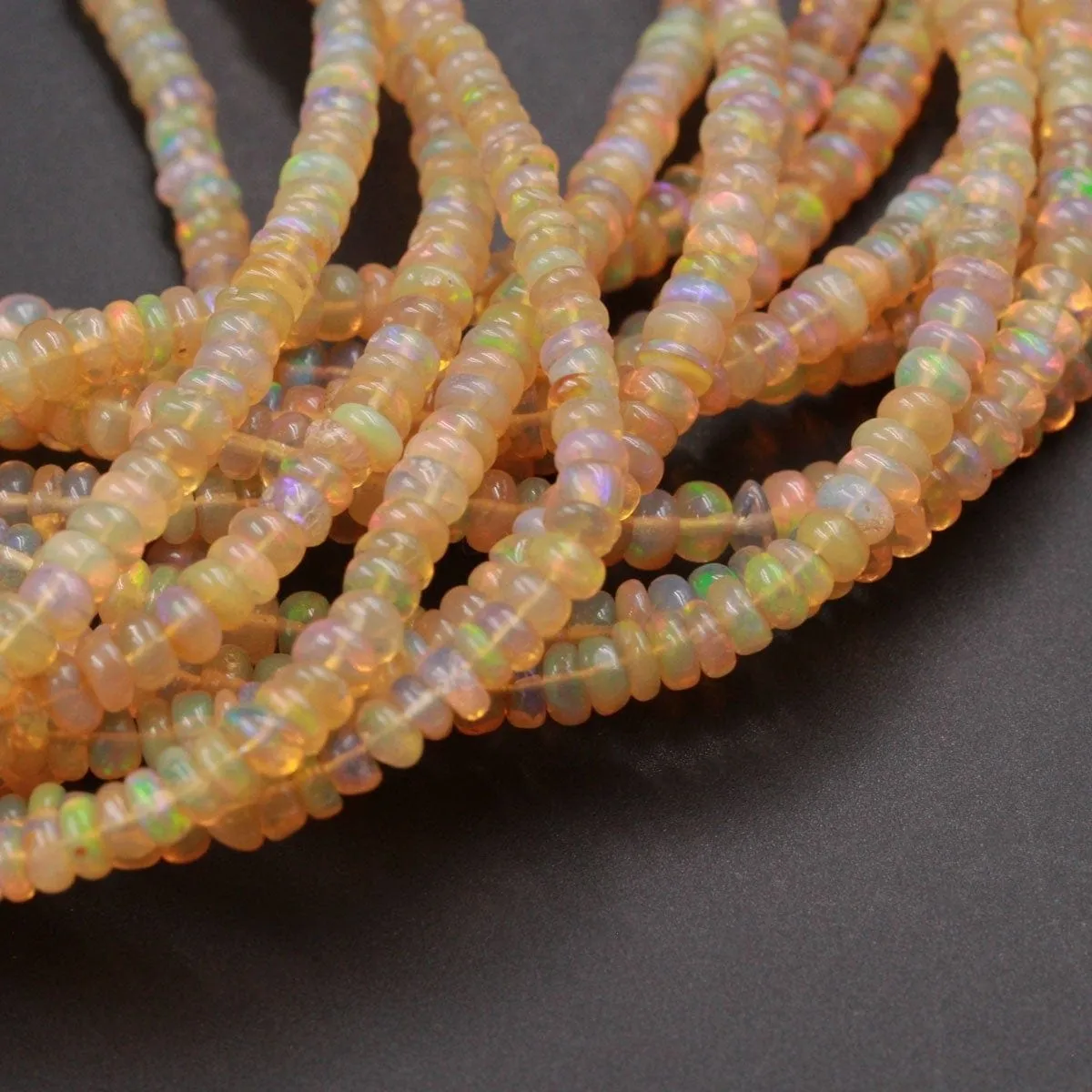 16 Inches Ethiopian Opal Beads Rondelle Graduating 3mm 4mm AAA Super Flashy Fiery Rainbow Yellow Opal Smooth Rondelle Beads 16" Strand A6