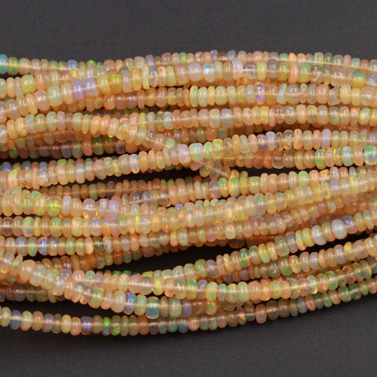 16 Inches Ethiopian Opal Beads Rondelle Graduating 3mm 4mm AAA Super Flashy Fiery Rainbow Yellow Opal Smooth Rondelle Beads 16" Strand A6