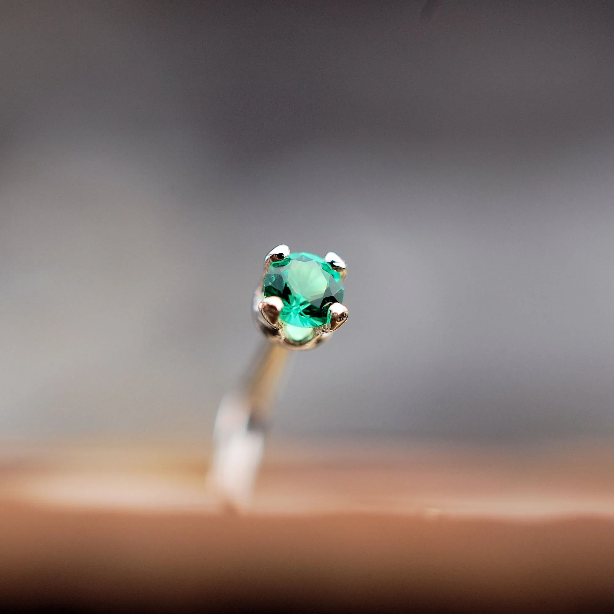 2mm Emerald and Silver Nose Stud