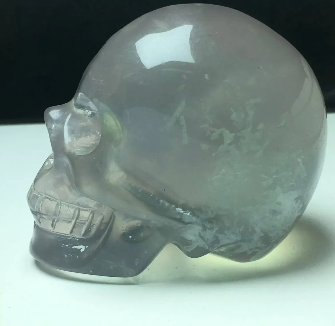 Exquisite fluorite gemstone carved Skull