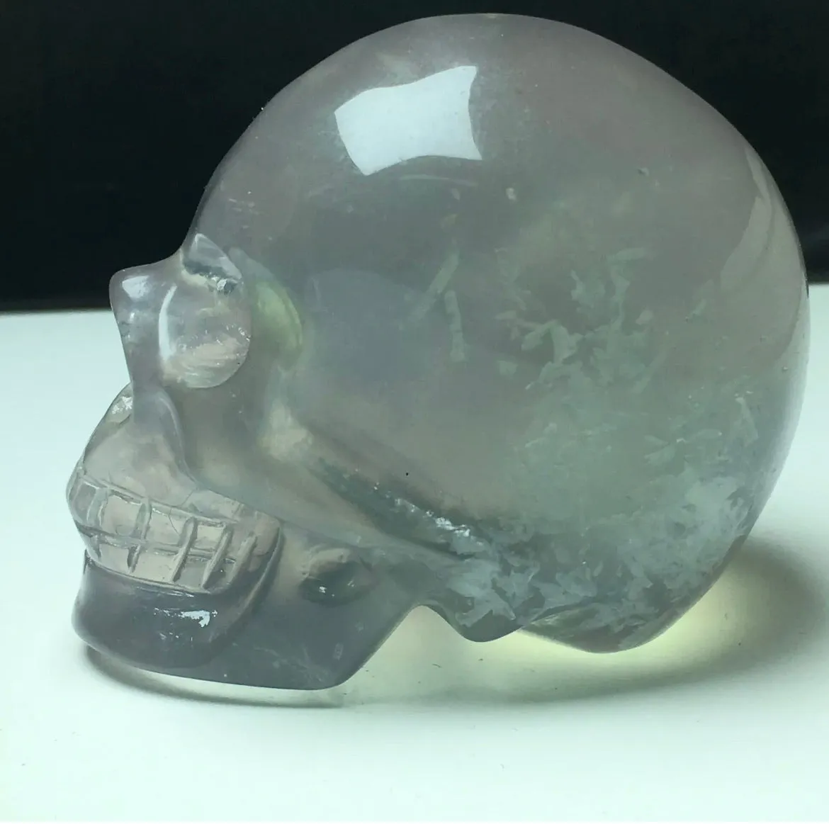 Exquisite fluorite gemstone carved Skull