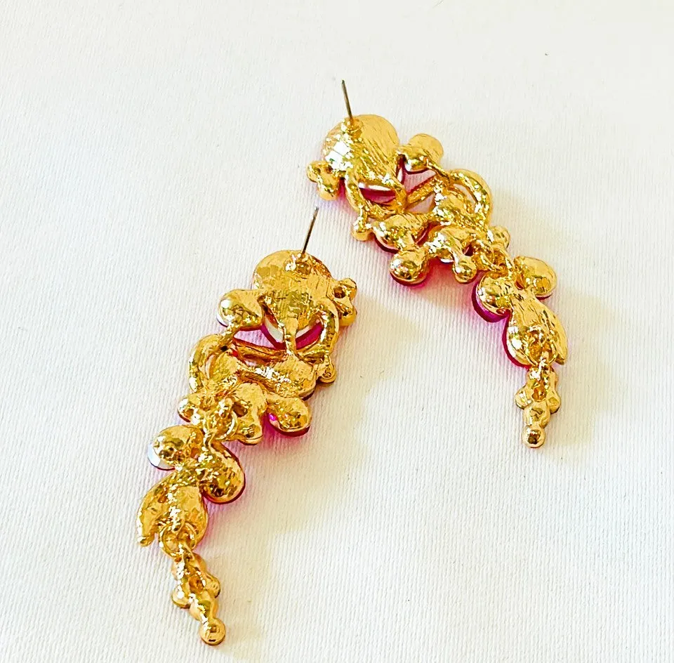 Fabulous 90s pink rhinestone style statement earrings.