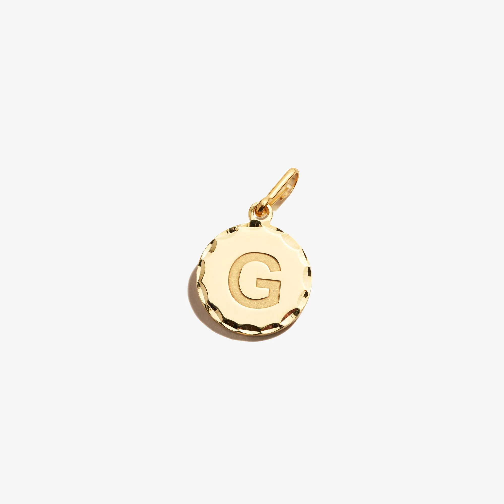 Initial G Charm