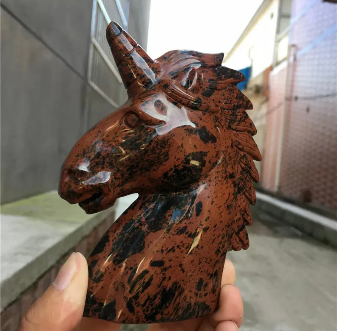 Natural red Mahogany Obsidian gemstone unicorn