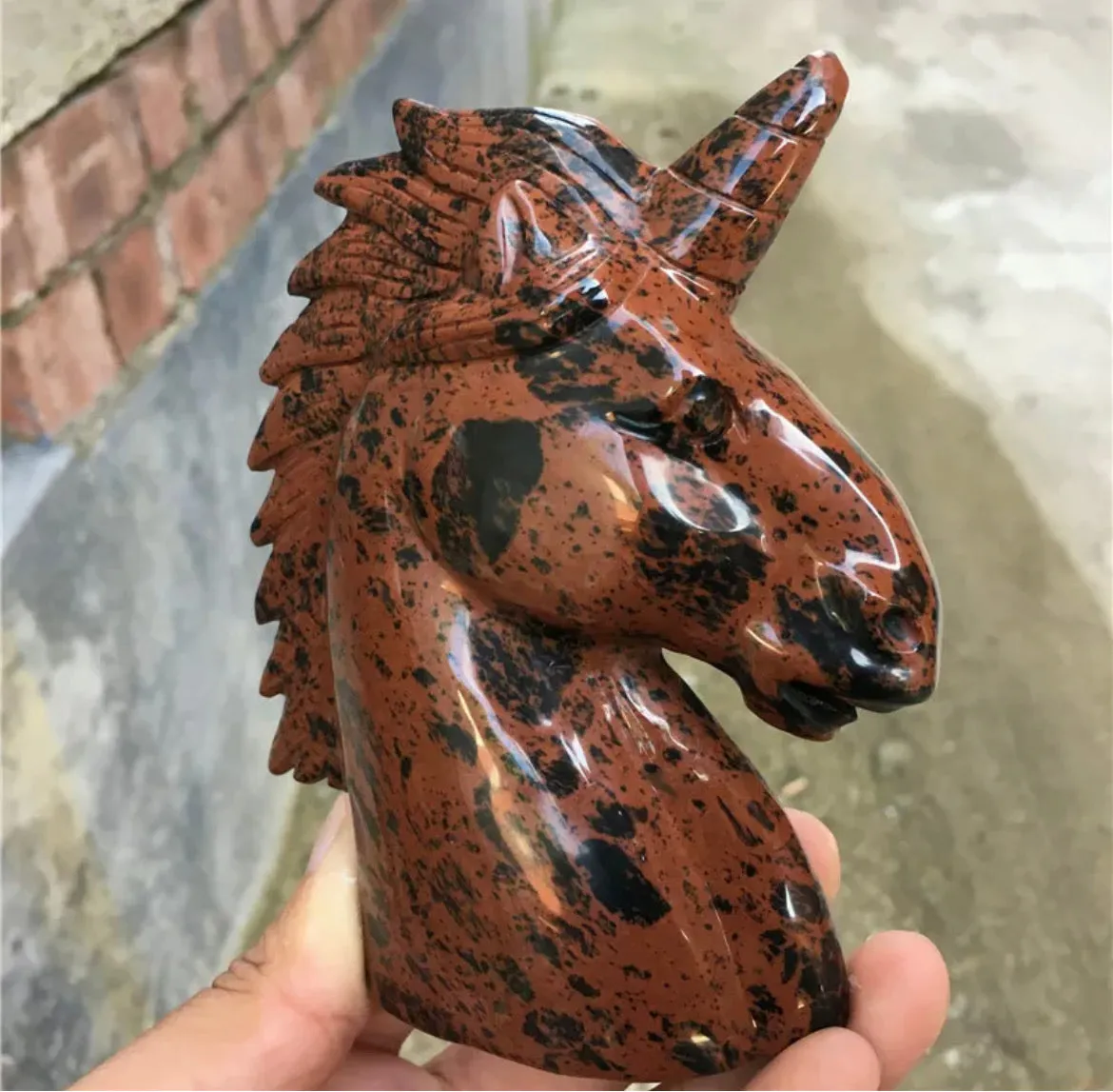 Natural red Mahogany Obsidian gemstone unicorn