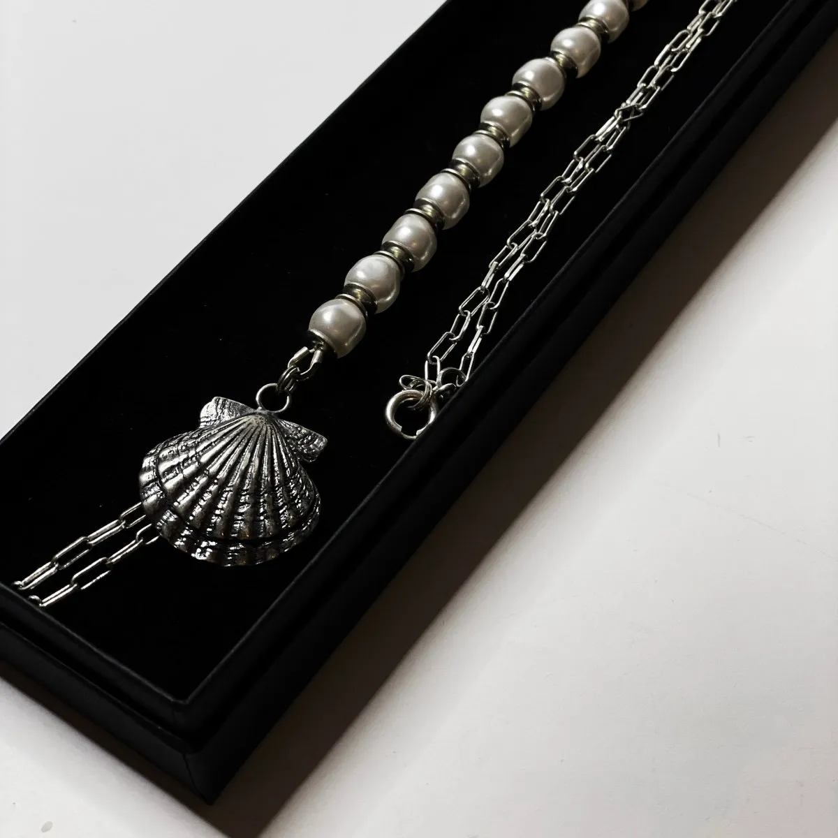 SILVER SHELL BONDAGE